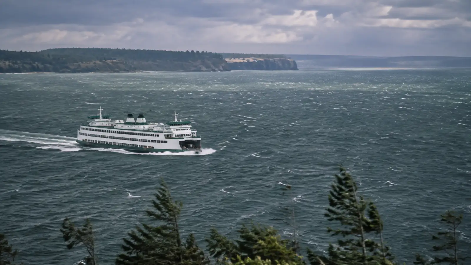 A ferry crossing an exposed strait in choppy grey water